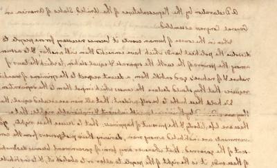 Handwritten draft of the Declaration of Independence on slightly yellowed paper.